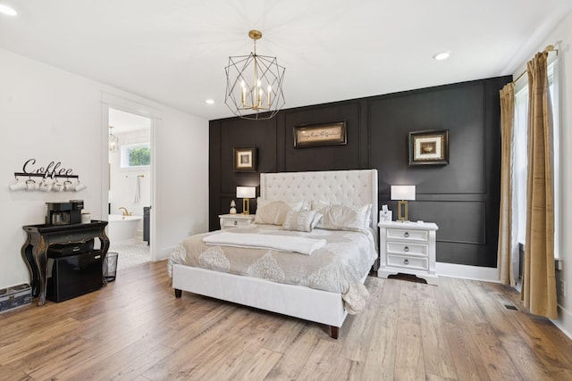 5128 Terravista Ln, Franklin, TN 37064 - bedroom featuring wood finished floors, a chandelier, recessed lighting, and ensuite bath