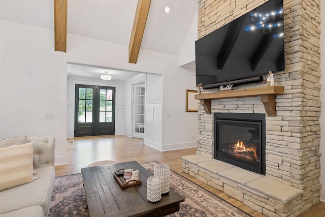 5128 Terravista Ln, Franklin, TN 37064 - living area featuring wood finished floors, a fireplace, and french doors