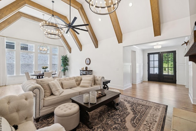 5128 Terravista Ln, Franklin, TN 37064 - living room with a chandelier, beamed ceiling, wood finished floors, high vaulted ceiling, and recessed lighting