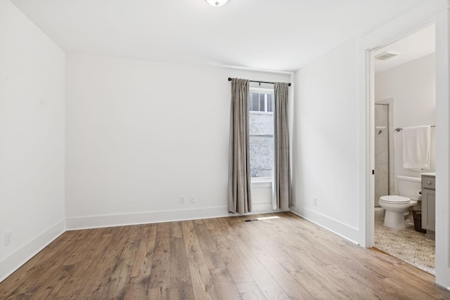 5128 Terravista Ln, Franklin, TN 37064 - unfurnished bedroom featuring wood finished floors and ensuite bathroom
