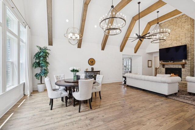 5128 Terravista Ln, Franklin, TN 37064 - dining room with a chandelier, high vaulted ceiling, beamed ceiling, wood finished floors, and healthy amount of natural light
