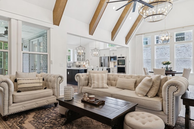 5128 Terravista Ln, Franklin, TN 37064 - living area with a chandelier, beamed ceiling, and high vaulted ceiling
