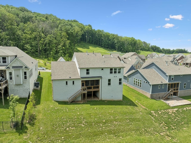 5128 Terravista Ln, Franklin, TN 37064 - back of house featuring stairway, a residential view, and a wooden deck