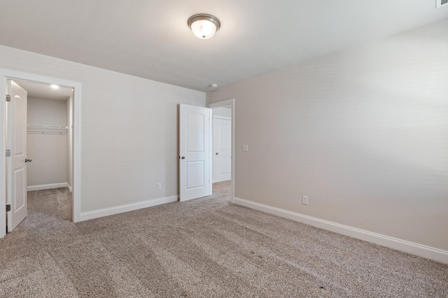 270 Netherlands Blvd, Lebanon, TN 37090 - unfurnished bedroom featuring carpet, a walk in closet, and a closet