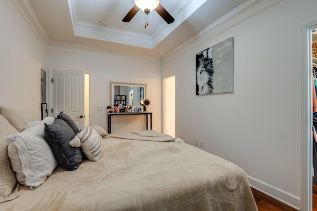 2003 Rural Plains Cir, Franklin, TN 37064 - bedroom featuring a tray ceiling, dark wood finished floors, crown molding, and ceiling fan