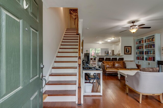 2003 Rural Plains Cir, Franklin, TN 37064 - entrance foyer with stairs, wood finished floors, a ceiling fan, and crown molding