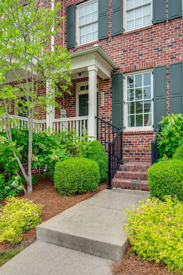 2003 Rural Plains Cir, Franklin, TN 37064 - property entrance with brick siding and a porch