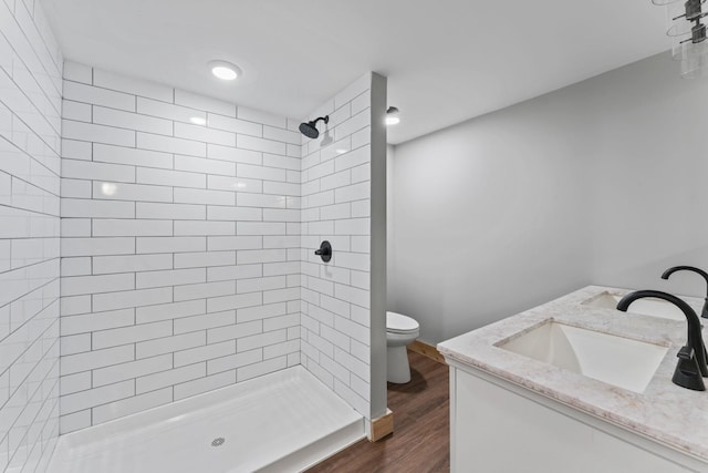7121 Robinson Dr, Fairview, TN 37062 - bathroom with a tile shower, wood finished floors, and vanity