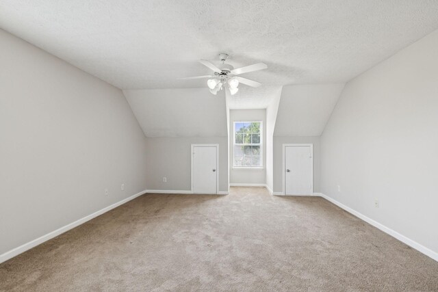 1882 Portway Rd, Spring Hill, TN 37174 - bonus room featuring a ceiling fan, carpet, vaulted ceiling, and a textured ceiling