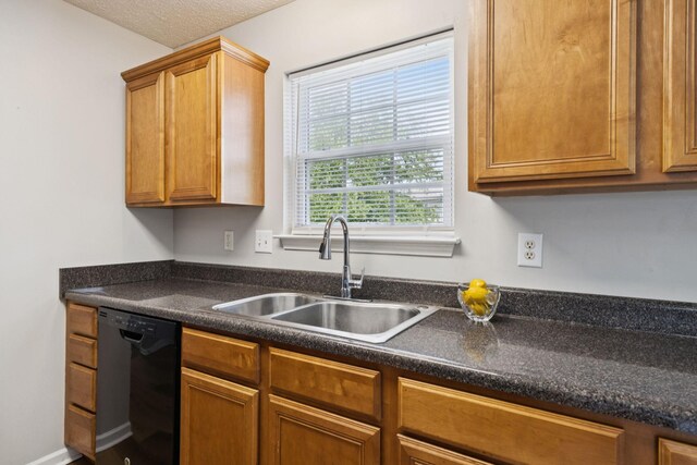 1882 Portway Rd, Spring Hill, TN 37174 - kitchen with dishwasher, dark countertops, and brown cabinets