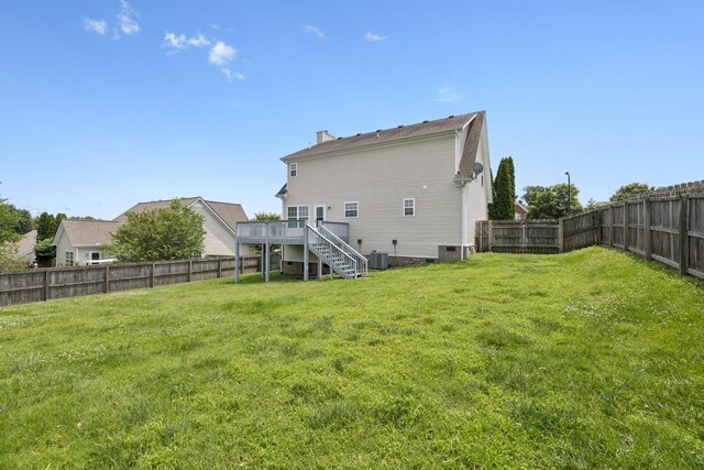 1882 Portway Rd, Spring Hill, TN 37174 - back of house with a fenced backyard, stairway, a wooden deck, and a chimney