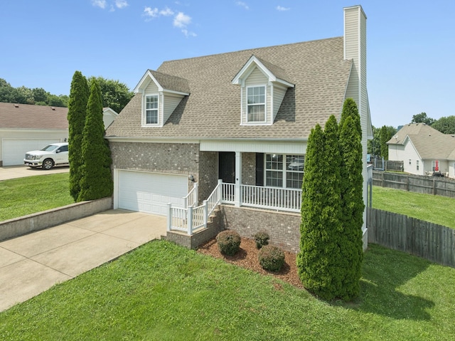 1882 Portway Rd, Spring Hill, TN 37174 - new england style home with covered porch, brick siding, concrete driveway, a shingled roof, and a chimney