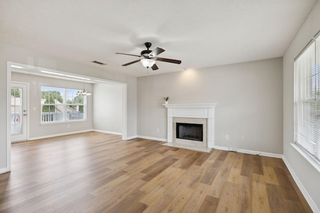 1882 Portway Rd, Spring Hill, TN 37174 - unfurnished living room with a ceiling fan, light wood-style flooring, and plenty of natural light