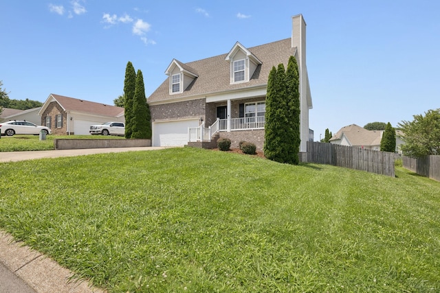 1882 Portway Rd, Spring Hill, TN 37174 - cape cod home with driveway, brick siding, a chimney, roof with shingles, and covered porch