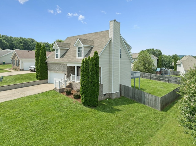 1882 Portway Rd, Spring Hill, TN 37174 - view of front facade featuring concrete driveway, a chimney, an attached garage, and roof with shingles