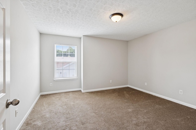 1882 Portway Rd, Spring Hill, TN 37174 - unfurnished room featuring a textured ceiling and carpet