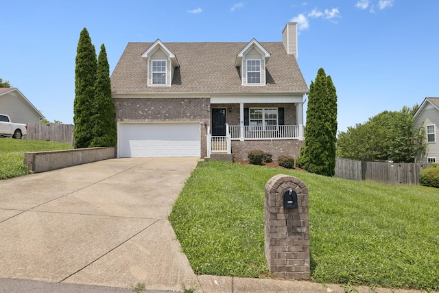 1882 Portway Rd, Spring Hill, TN 37174 - view of front of home featuring brick siding, driveway, an attached garage, a porch, and a chimney