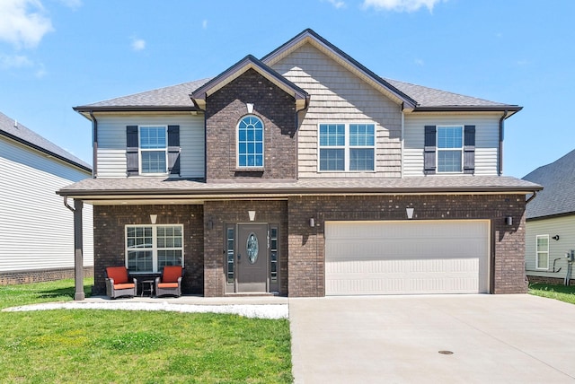 1613 Kestrel Dr, Clarksville, TN 37040 - craftsman-style home with driveway, a garage, a porch, and brick siding