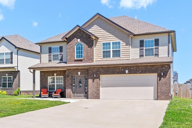 1613 Kestrel Dr, Clarksville, TN 37040 - view of front of property featuring brick siding, concrete driveway, an attached garage, and a shingled roof