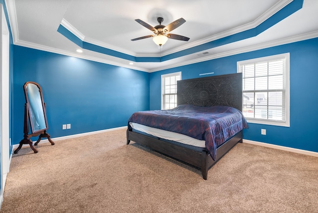 1613 Kestrel Dr, Clarksville, TN 37040 - bedroom featuring a tray ceiling, carpet flooring, crown molding, and ceiling fan