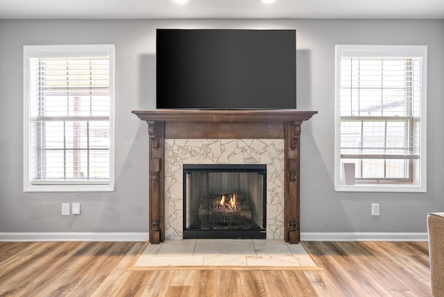 1613 Kestrel Dr, Clarksville, TN 37040 - detailed view of wood finished floors, a tile fireplace, and recessed lighting