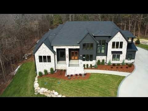 6128 Lookaway Cir, Franklin, TN 37067 - view of front of property featuring a front lawn and concrete driveway