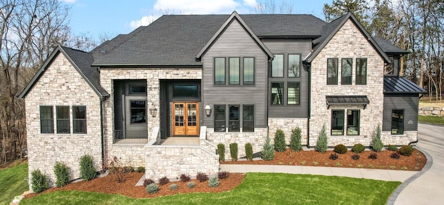 6128 Lookaway Cir, Franklin, TN 37067 - view of front of property with stone siding, french doors, and a standing seam roof