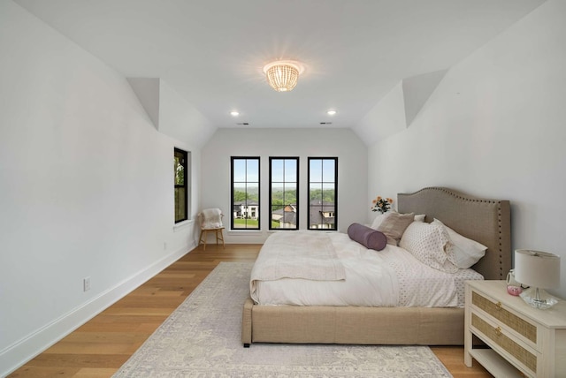 6128 Lookaway Cir, Franklin, TN 37067 - bedroom with vaulted ceiling, wood finished floors, and recessed lighting