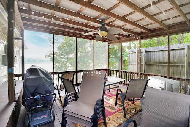 211 Lewis Cir, Dover, TN 37058 - sunroom / solarium featuring outdoor dining area, a ceiling fan, a water view, and healthy amount of natural light
