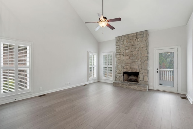 324 Julianna Cir, Franklin, TN 37064 - unfurnished living room with high vaulted ceiling, a ceiling fan, a fireplace, and wood finished floors
