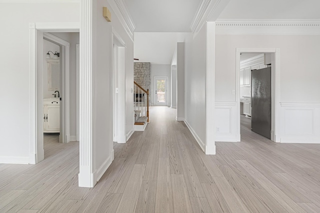 324 Julianna Cir, Franklin, TN 37064 - hall with stairs, light wood-style floors, and ornamental molding