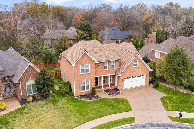 324 Julianna Cir, Franklin, TN 37064 - traditional-style home featuring concrete driveway and a garage