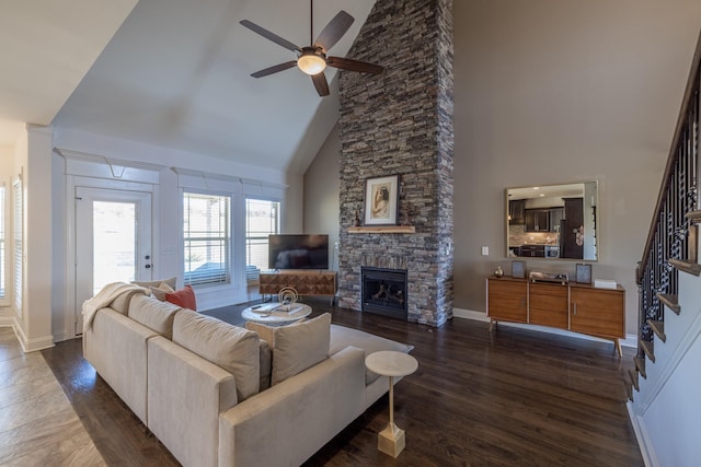 160 Dobson Knob Trl, Nolensville, TN 37135 - living area featuring high vaulted ceiling, a ceiling fan, stairs, dark wood-style flooring, and a stone fireplace