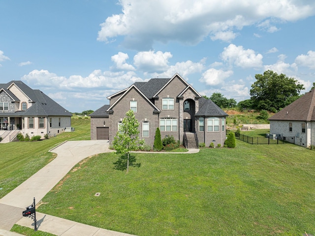 160 Dobson Knob Trl, Nolensville, TN 37135 - view of front facade featuring driveway, a garage, and brick siding