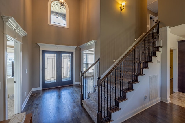 160 Dobson Knob Trl, Nolensville, TN 37135 - entryway featuring french doors, stairs, a towering ceiling, and wood finished floors
