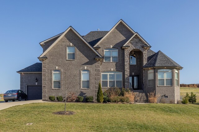 160 Dobson Knob Trl, Nolensville, TN 37135 - french provincial home with brick siding, a front yard, driveway, a garage, and roof with shingles