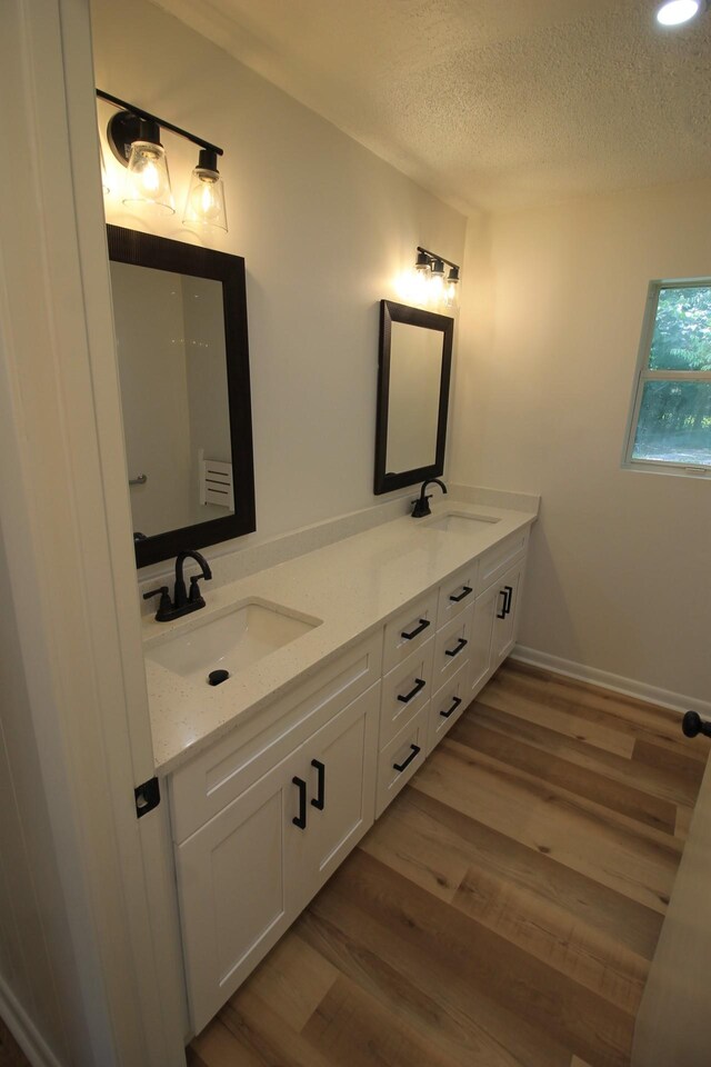 151 Dawn St, Morrison, TN 37357 - full bath featuring double vanity, a textured ceiling, wood finished floors, and recessed lighting