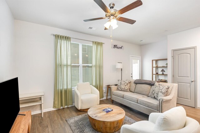 414 Manor Row, Pleasant View, TN 37146 - living room with a ceiling fan and wood finished floors