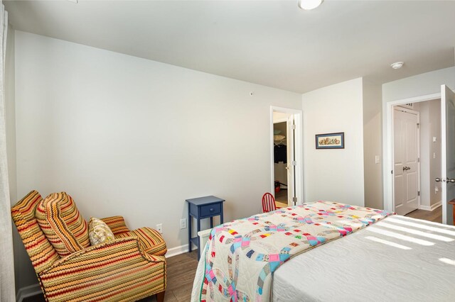 414 Manor Row, Pleasant View, TN 37146 - bedroom featuring wood finished floors and baseboards