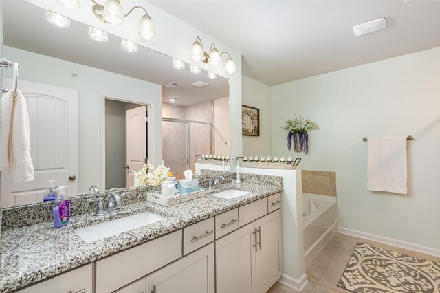 414 Manor Row, Pleasant View, TN 37146 - bathroom featuring double vanity, a shower stall, a bath, and tile patterned floors
