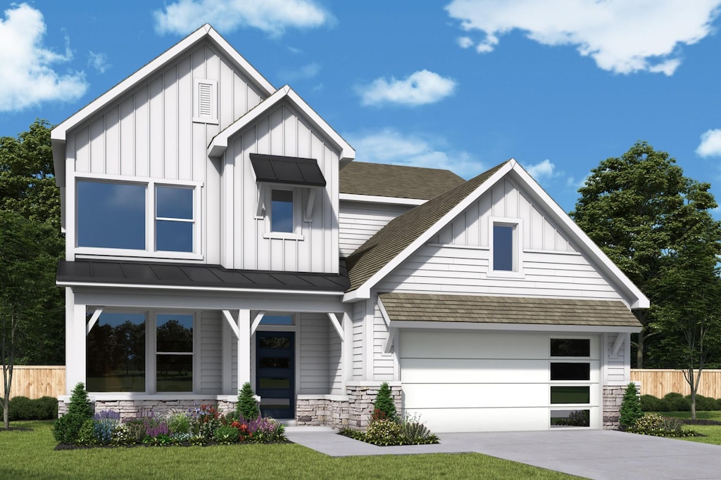 1311 Linn Cove Ct, Gallatin, TN 37066 - view of front of home with board and batten siding, a shingled roof, covered porch, and concrete driveway
