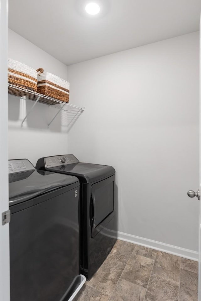 2400 Kaycee Ct, Lebanon, TN 37087 - washroom featuring washing machine and dryer and light stone finish floors