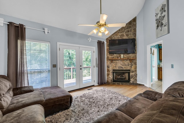 1128 Tiftonia View Rd, Chattanooga, TN 37419 - living area featuring french doors, ceiling fan, wood finished floors, a fireplace, and high vaulted ceiling