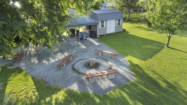 70 Nancy Ave, Cadiz, KY 42211 - view of green lawn featuring a storage shed