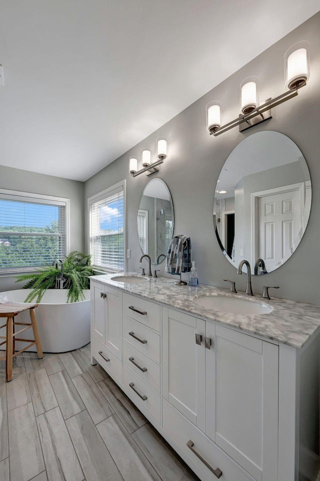 206 Stillcreek Dr, Franklin, TN 37064 - full bathroom with double vanity and a freestanding bath
