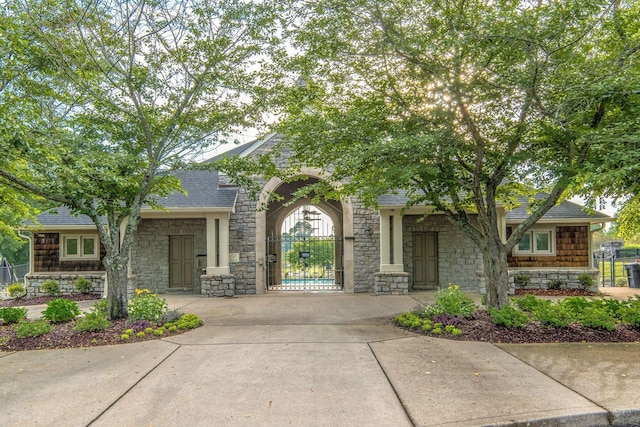 206 Stillcreek Dr, Franklin, TN 37064 - view of front of house featuring stone siding and roof with shingles