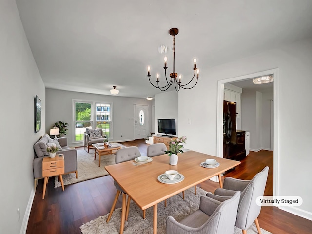 480 Bamburg Dr, Clarksville, TN 37040 - dining room featuring dark wood finished floors and a chandelier