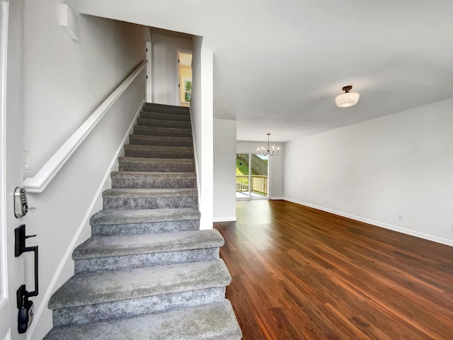 480 Bamburg Dr, Clarksville, TN 37040 - staircase with wood finished floors and a chandelier