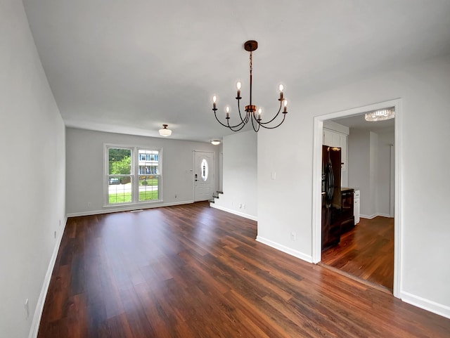 480 Bamburg Dr, Clarksville, TN 37040 - spare room featuring a chandelier and dark wood-style flooring