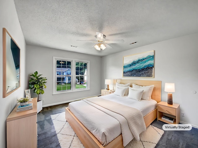 480 Bamburg Dr, Clarksville, TN 37040 - bedroom with carpet floors, a textured ceiling, and a ceiling fan